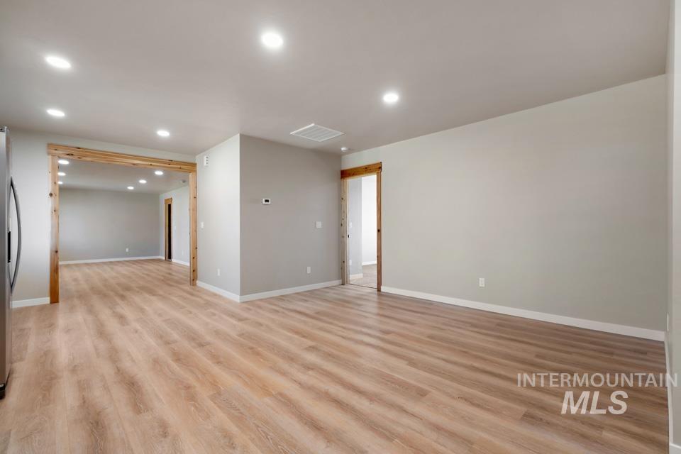 535 Day Road Weiser, ID 83672 - Photo 21 of 44 Unfurnished room with light wood finished floors and recessed lighting