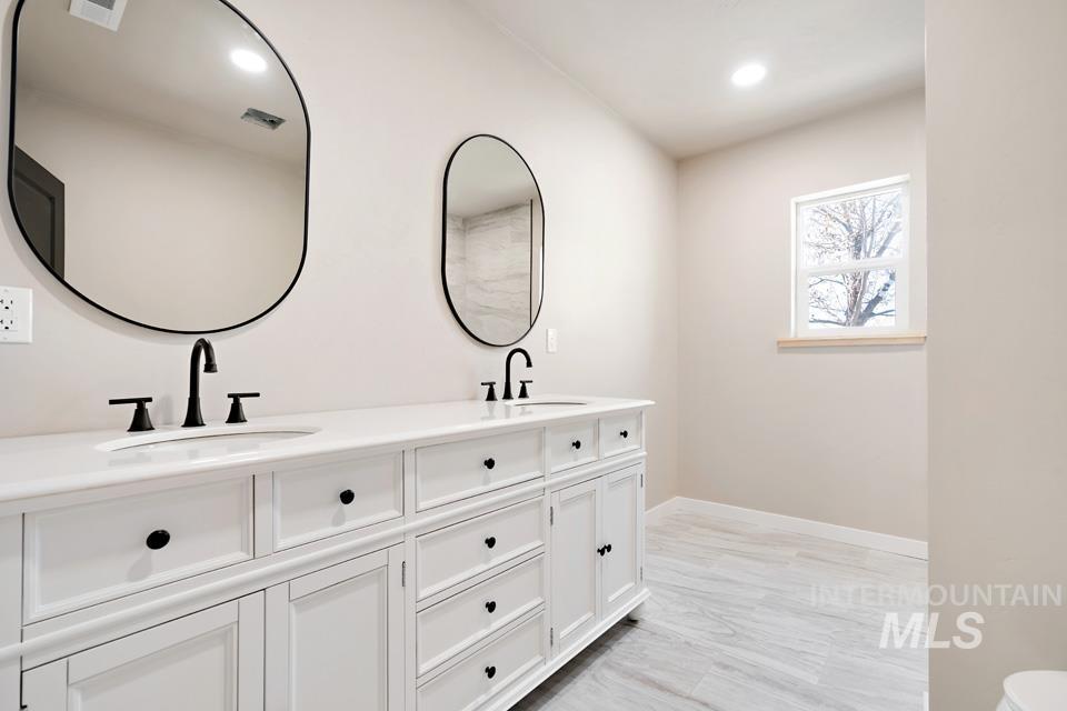 535 Day Road Weiser, ID 83672 - Photo 24 of 44 Full bathroom featuring double vanity and recessed lighting