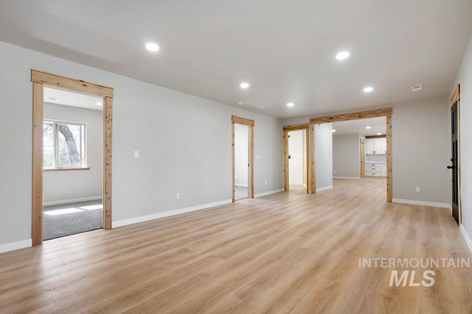 535 Day Road Weiser, ID 83672 - Photo 3 of 44 Spare room featuring light wood-type flooring and recessed lighting
