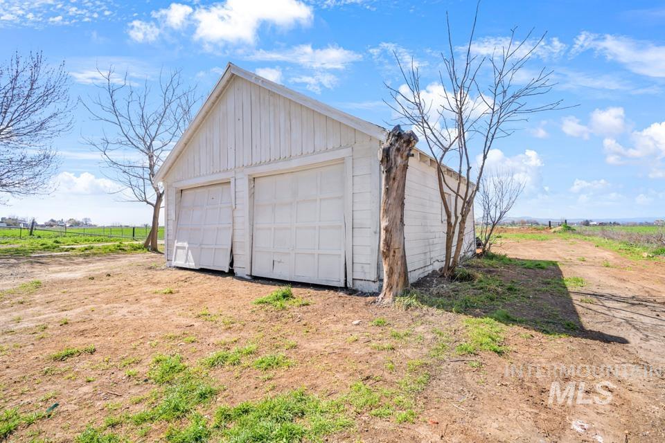 535 Day Road Weiser, ID 83672 - Photo 40 of 44 Detached garage featuring a view of rural / pastoral area
