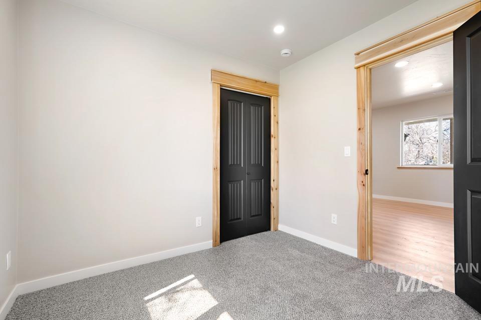 535 Day Road Weiser, ID 83672 - Photo 6 of 44 Unfurnished bedroom featuring recessed lighting and light colored carpet