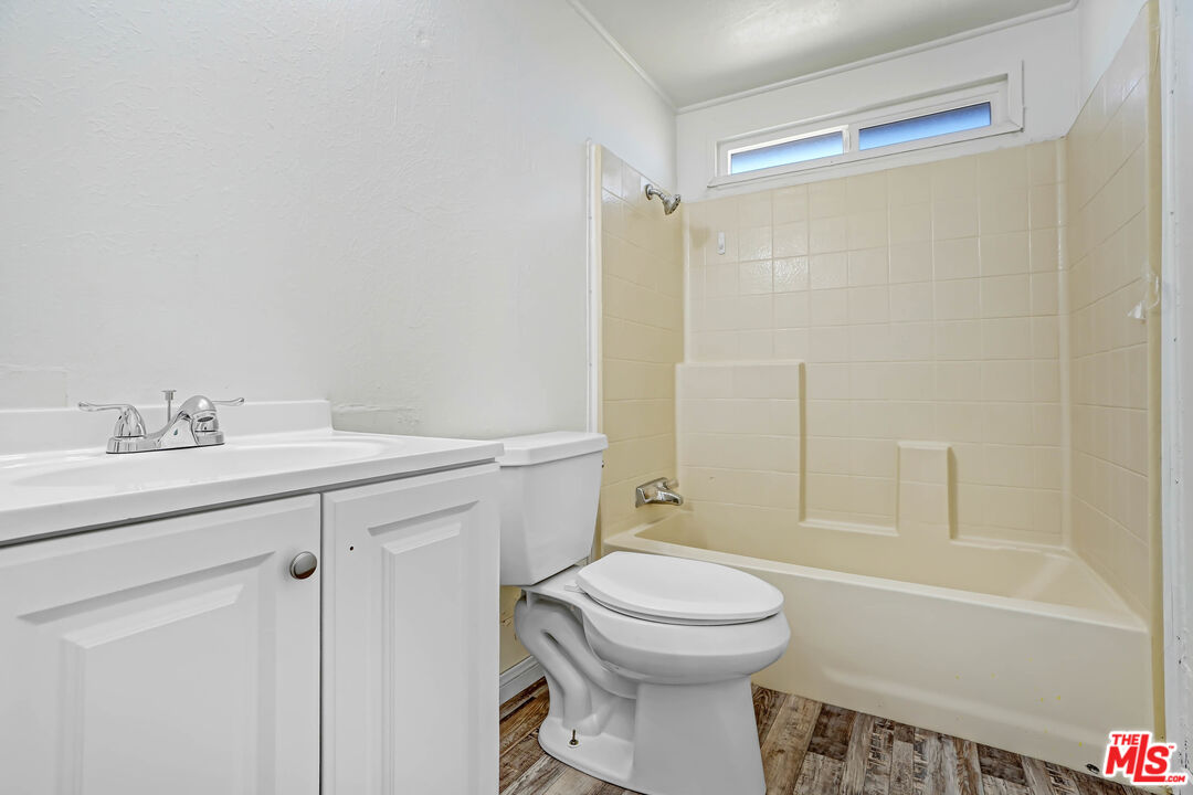 11351 Eaby Road Phelan, CA 92371 - Photo 14 of 23 a bathroom with a sink a toilet and shower
