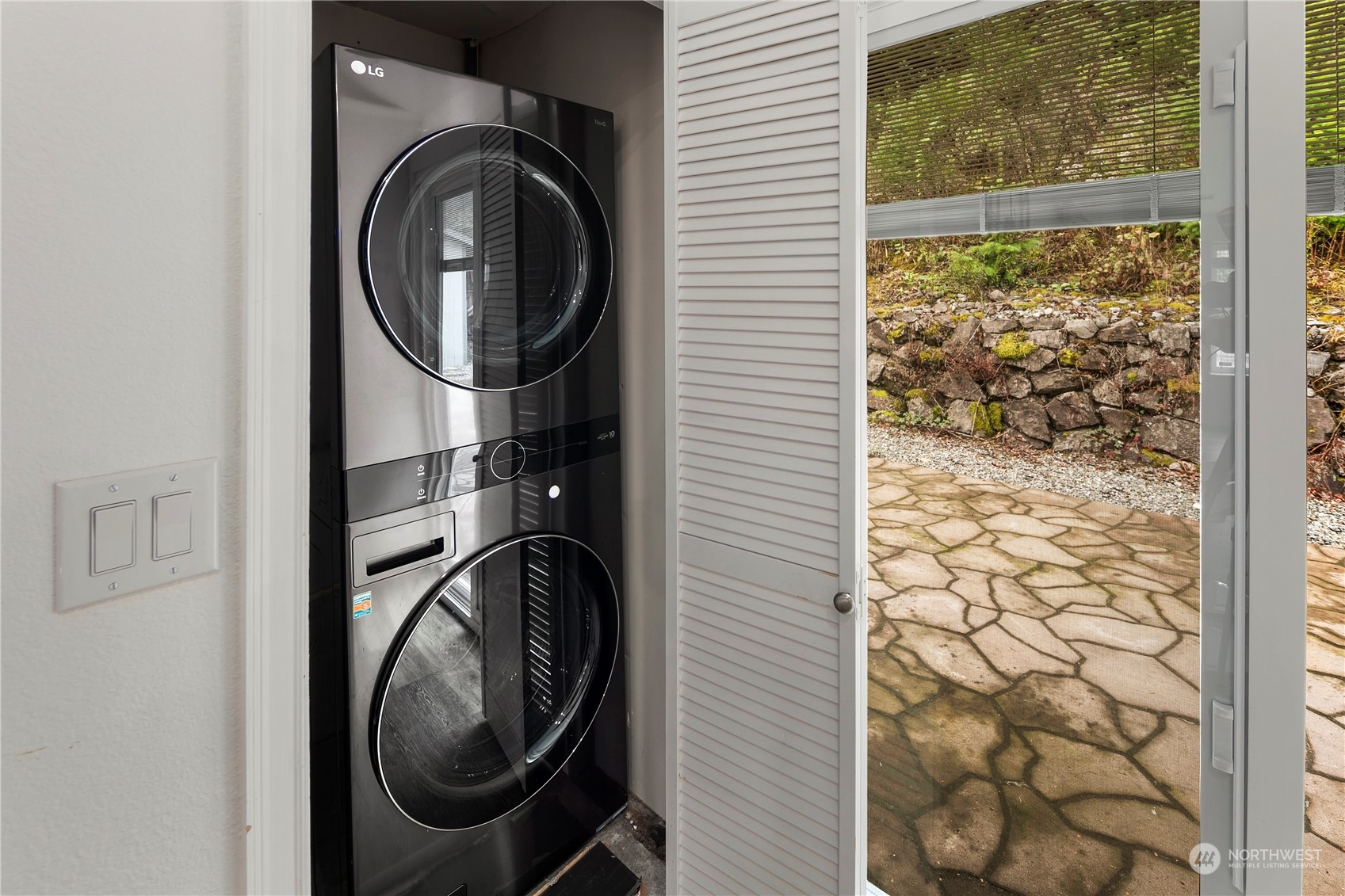 2207 Northeast 23rd Street Renton, WA 98056 - Photo 11 of 34 a utility room with dryer and washer