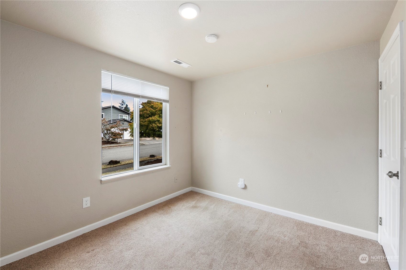 2207 Northeast 23rd Street Renton, WA 98056 - Photo 20 of 34 an empty room with a window