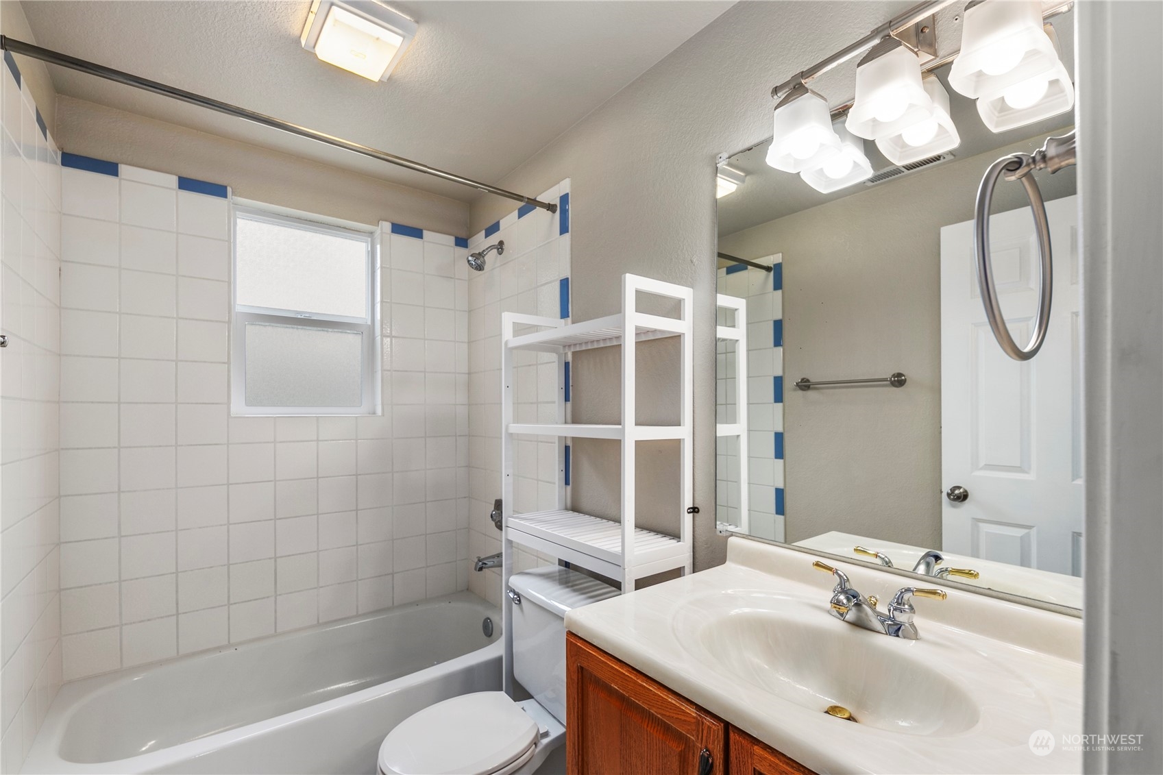 2207 Northeast 23rd Street Renton, WA 98056 - Photo 21 of 34 a bathroom with a sink toilet and shower