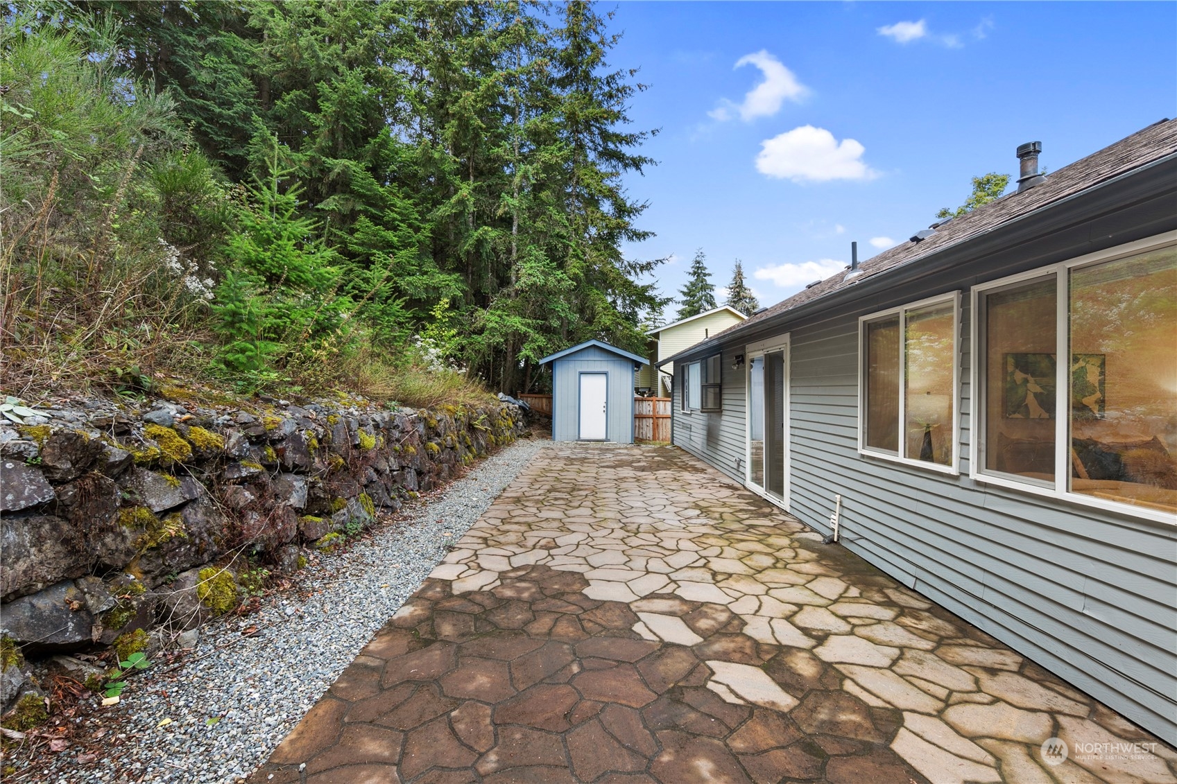 2207 Northeast 23rd Street Renton, WA 98056 - Photo 28 of 34 a front view of a house with a yard