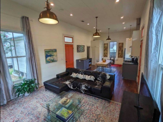 3408 Garrow Street, Unit A Houston, TX 77003 - Photo 16 of 30 a living room with furniture and a large window