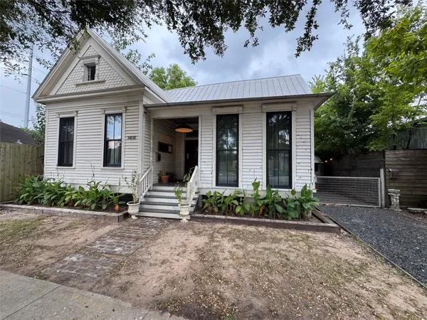 front view of a house with a small yard