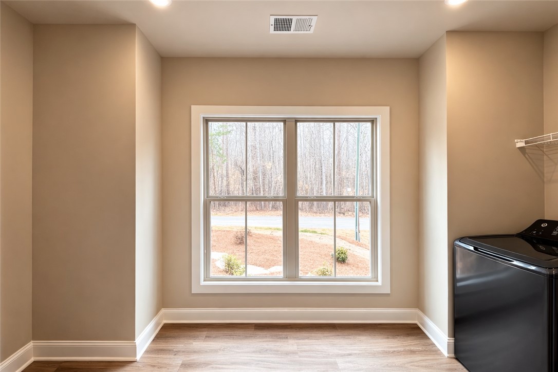 111 Birch Court Westminster, SC 29693 - Photo 11 of 27 This dedicated utility room offers convenient laundry solutions and natural light.