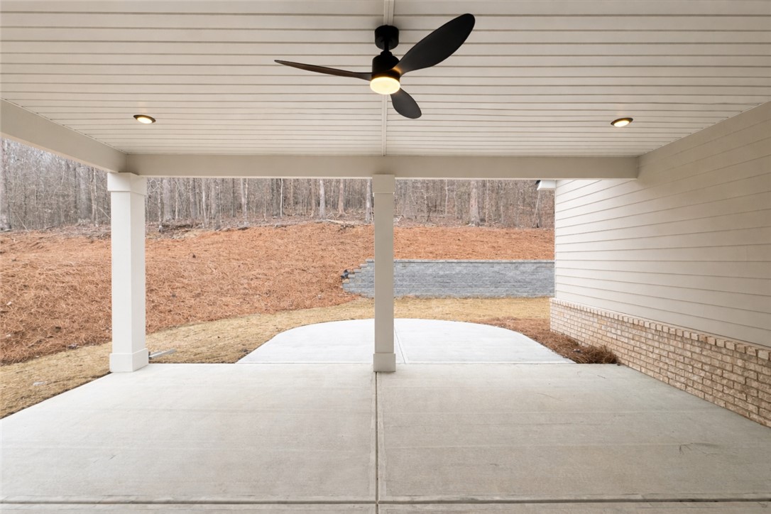 111 Birch Court Westminster, SC 29693 - Photo 26 of 27 This inviting covered patio offers a comfortable outdoor retreat with recessed lighting and a ceiling fan.