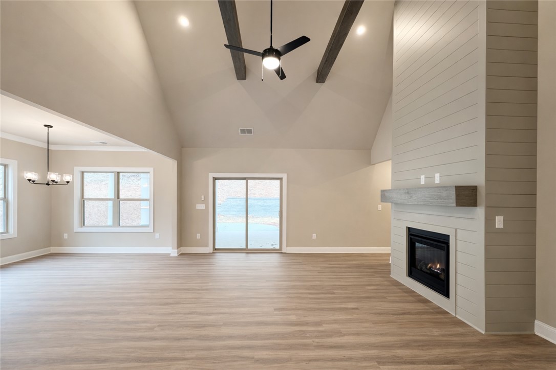 111 Birch Court Westminster, SC 29693 - Photo 3 of 27 This expansive living area offers vaulted ceilings and a modern fireplace, perfect for gatherings.