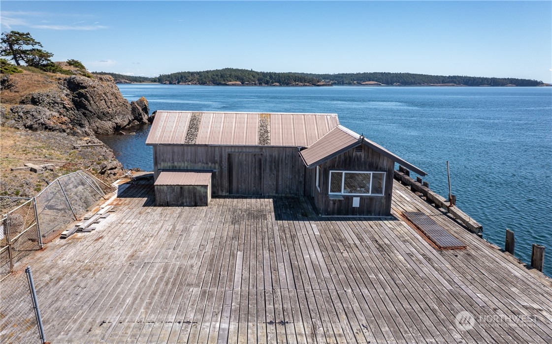 1996 Richardson Road Lopez Island, WA 98261 - Photo 6 of 16 a view of balcony with wooden floor and outdoor space