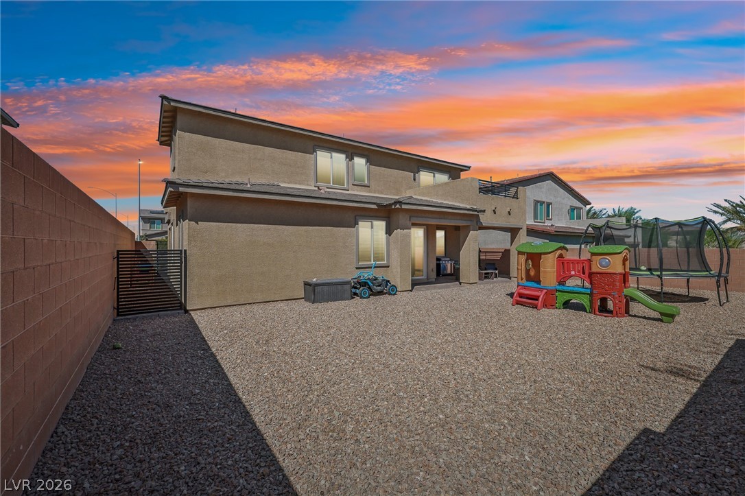 194 Viento Ridge Street Henderson, NV 89012 - Photo 69 of 72 A spacious gravel backyard offers low-maintenance outdoor living bordered by a privacy block wall.