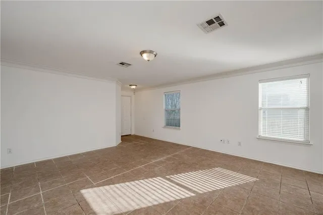 an empty room with windows