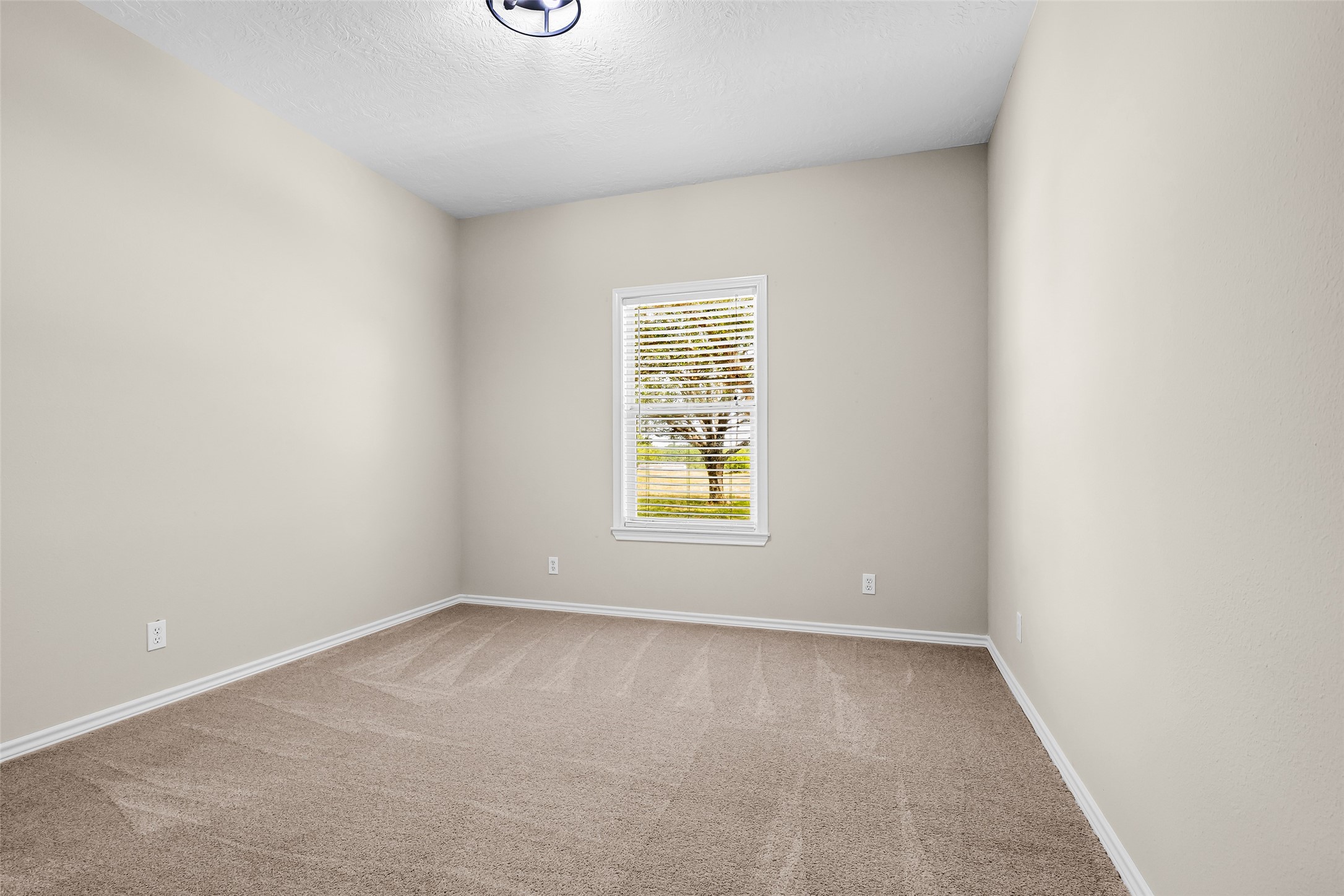 1075 Harrisburg Road Brenham, TX 77833 - Photo 27 of 48 One of the two bedrooms on the opposite side of the house with the guest bathroom