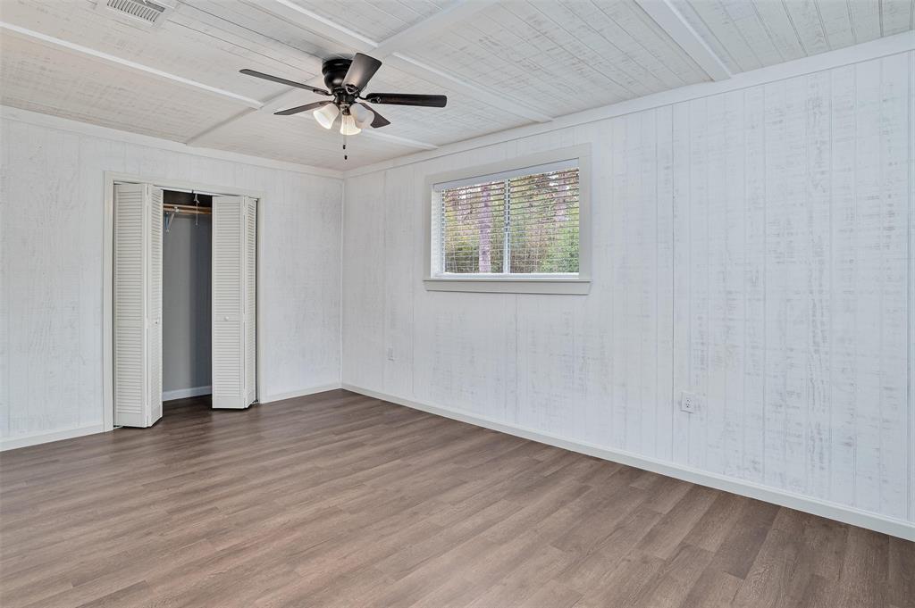 4340 Pruett Road Shreveport, LA 71107 - Photo 12 of 24 wooden floor in an empty room with a window