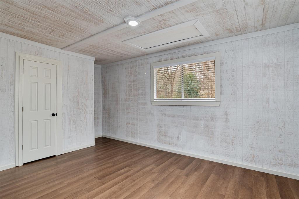 4340 Pruett Road Shreveport, LA 71107 - Photo 13 of 24 a view of an empty room with wooden floor and a window