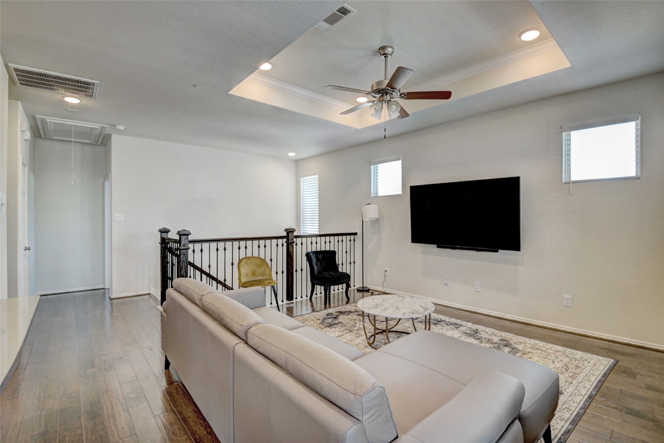 3104 Roseland Terrace Lane Houston, TX 77063 - Photo 4 of 14 a living room with furniture and a flat screen tv