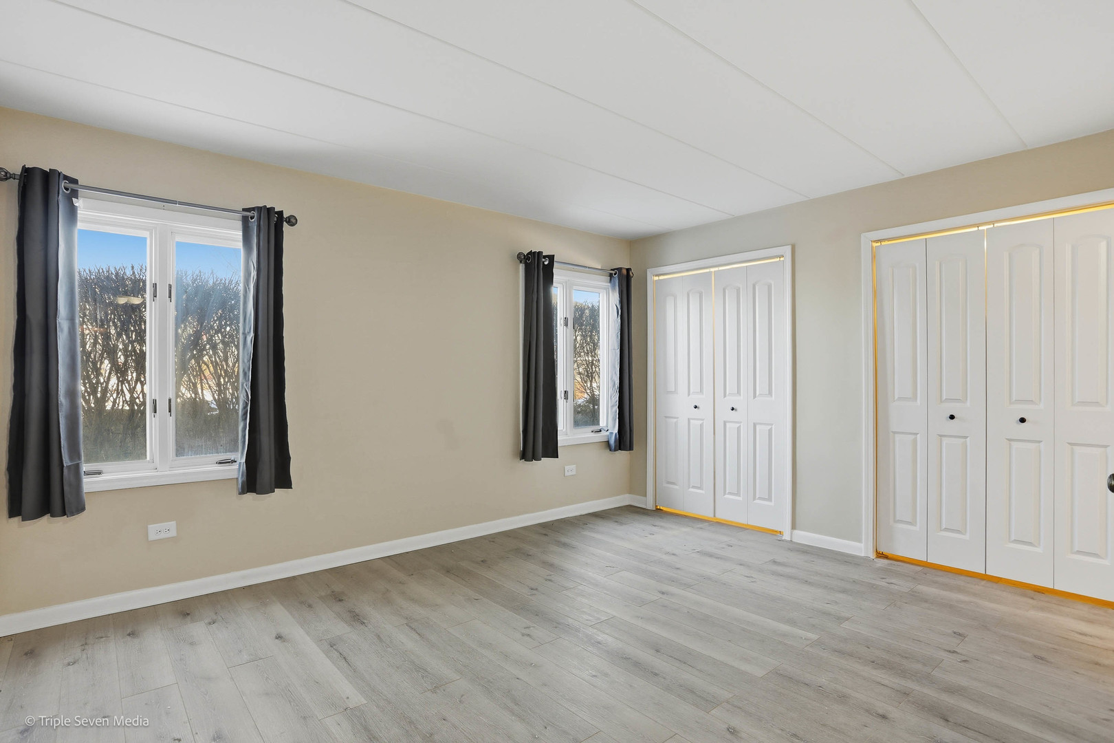 17236 Ridgeland Avenue, Unit 412 Tinley Park, IL 60477 - Photo 15 of 23 a view of an empty room with glass door