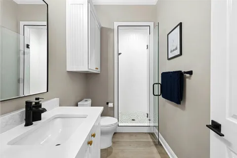 a bathroom with a sink and mirror