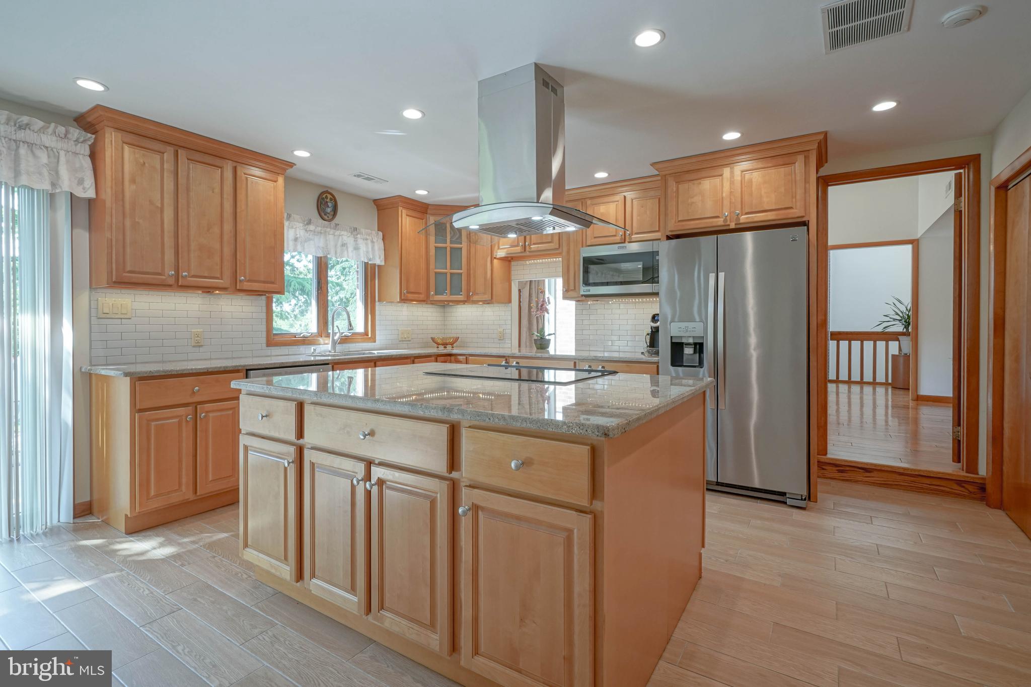 664 Union Road Mickleton, NJ 08056 - Photo 16 of 40 a kitchen with stainless steel appliances granite countertop a refrigerator a sink and a stove