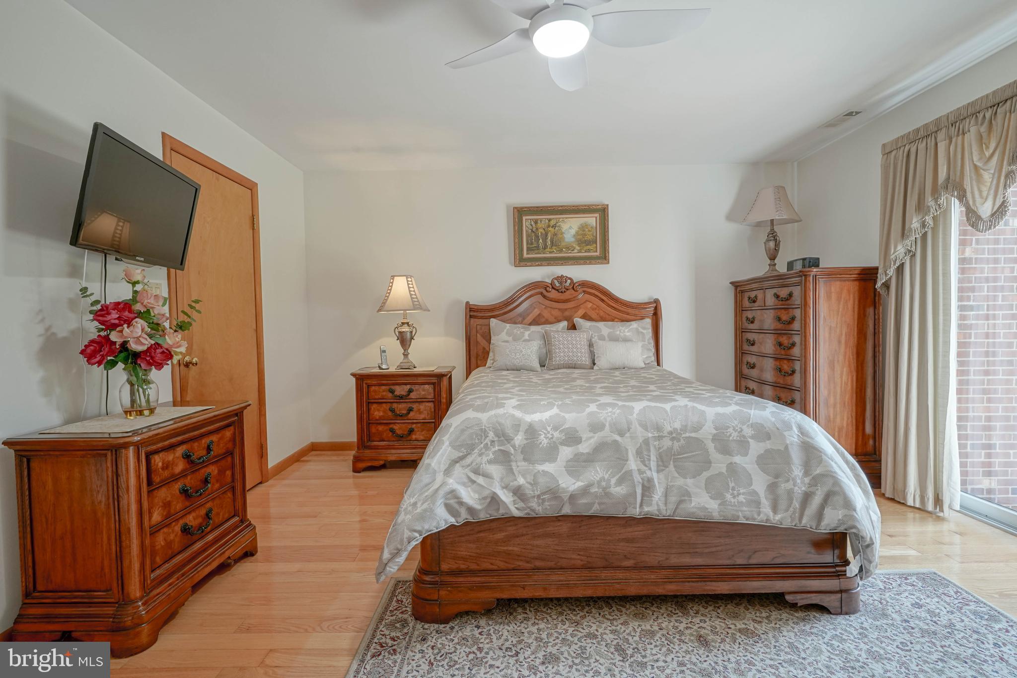 664 Union Road Mickleton, NJ 08056 - Photo 23 of 40 a bedroom with a bed and a flat screen television