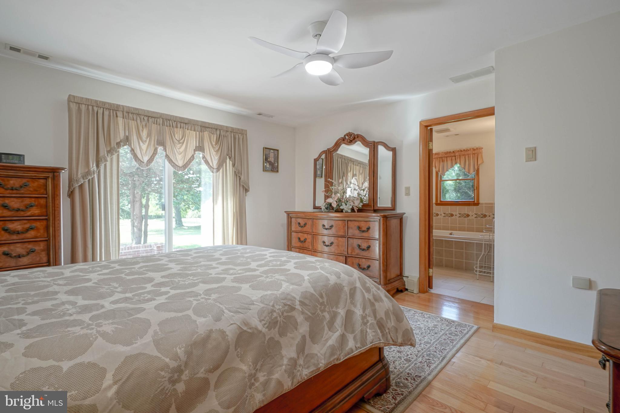 664 Union Road Mickleton, NJ 08056 - Photo 24 of 40 a bedroom with a bed and a dresser