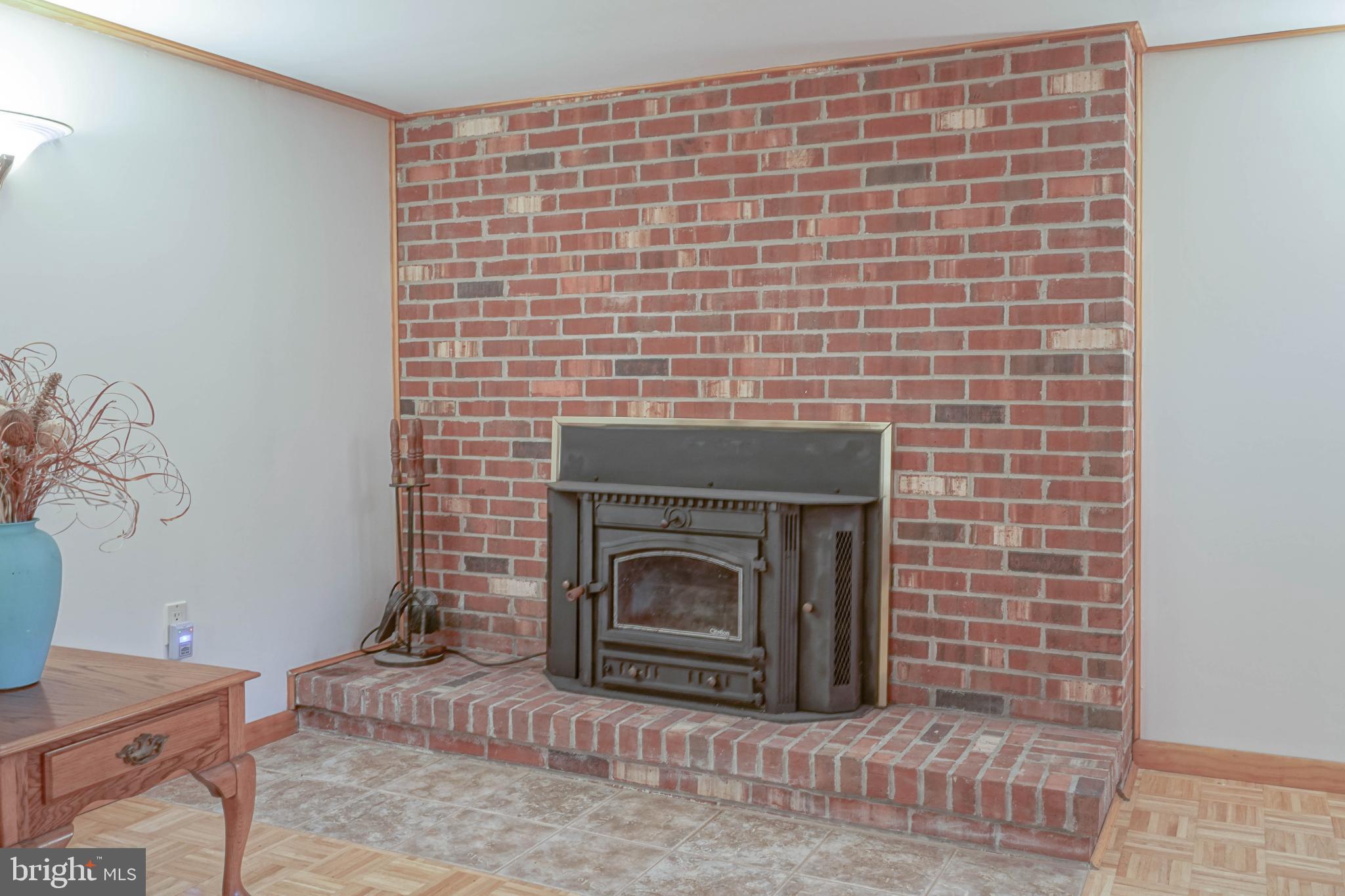 664 Union Road Mickleton, NJ 08056 - Photo 32 of 40 a brick oven with fireplace a oven and white cabinets