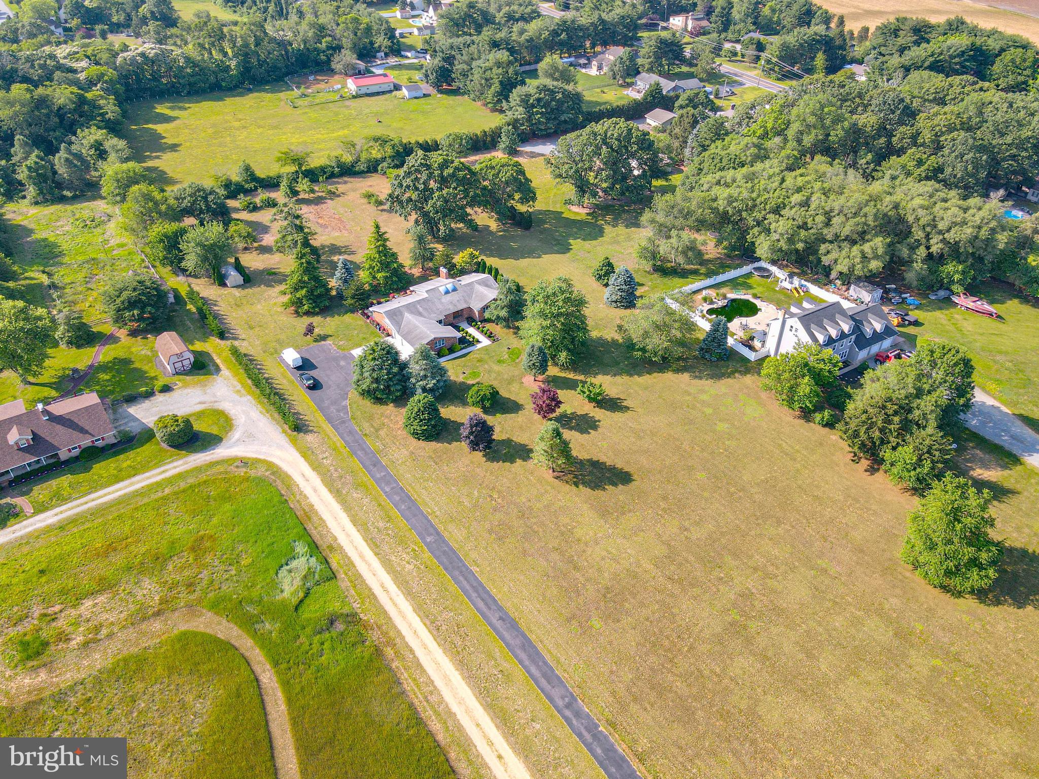 664 Union Road Mickleton, NJ 08056 - Photo 36 of 40 an aerial view of a house with a swimming pool