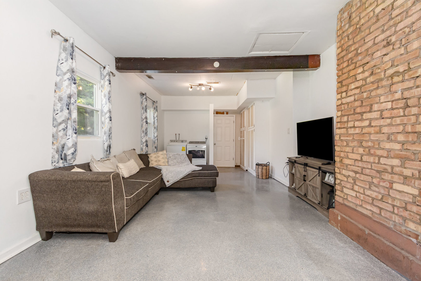 2535 Caton Farm Road Joliet, IL 60435 - Photo 12 of 25 a living room with furniture and a flat screen tv
