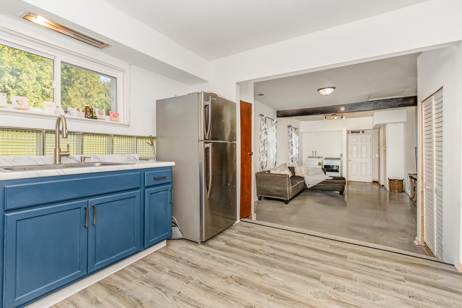 2535 Caton Farm Road Joliet, IL 60435 - Photo 15 of 25 a kitchen with a refrigerator and a sink