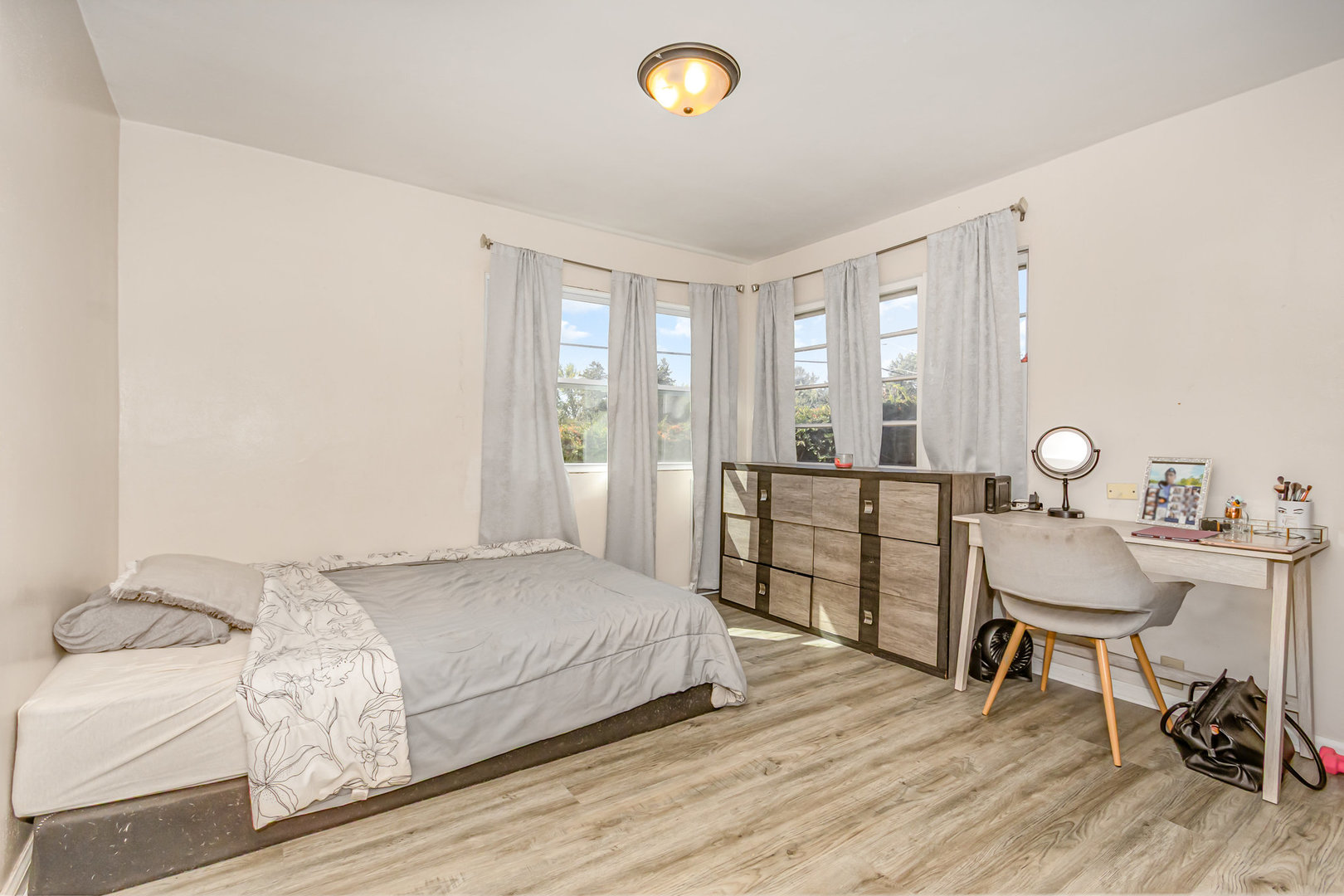 2535 Caton Farm Road Joliet, IL 60435 - Photo 17 of 25 a bedroom with a bed and a table in it