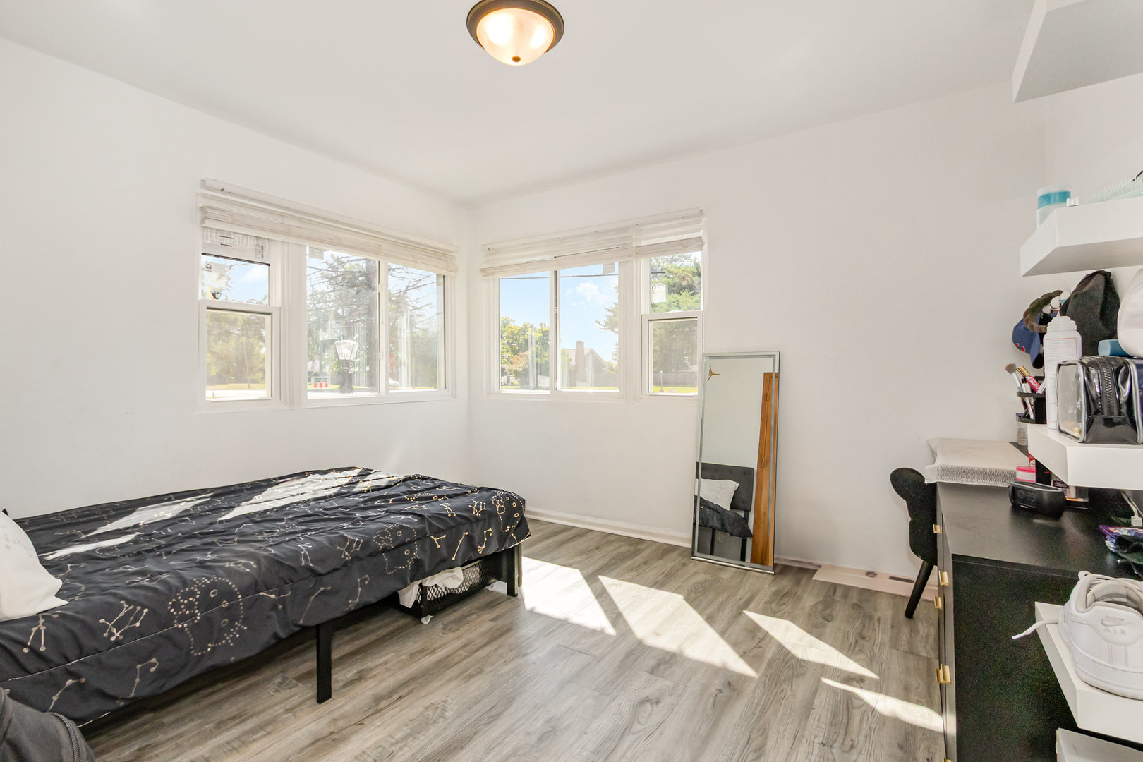 2535 Caton Farm Road Joliet, IL 60435 - Photo 18 of 25 a bedroom with a bed and a desk next to a window