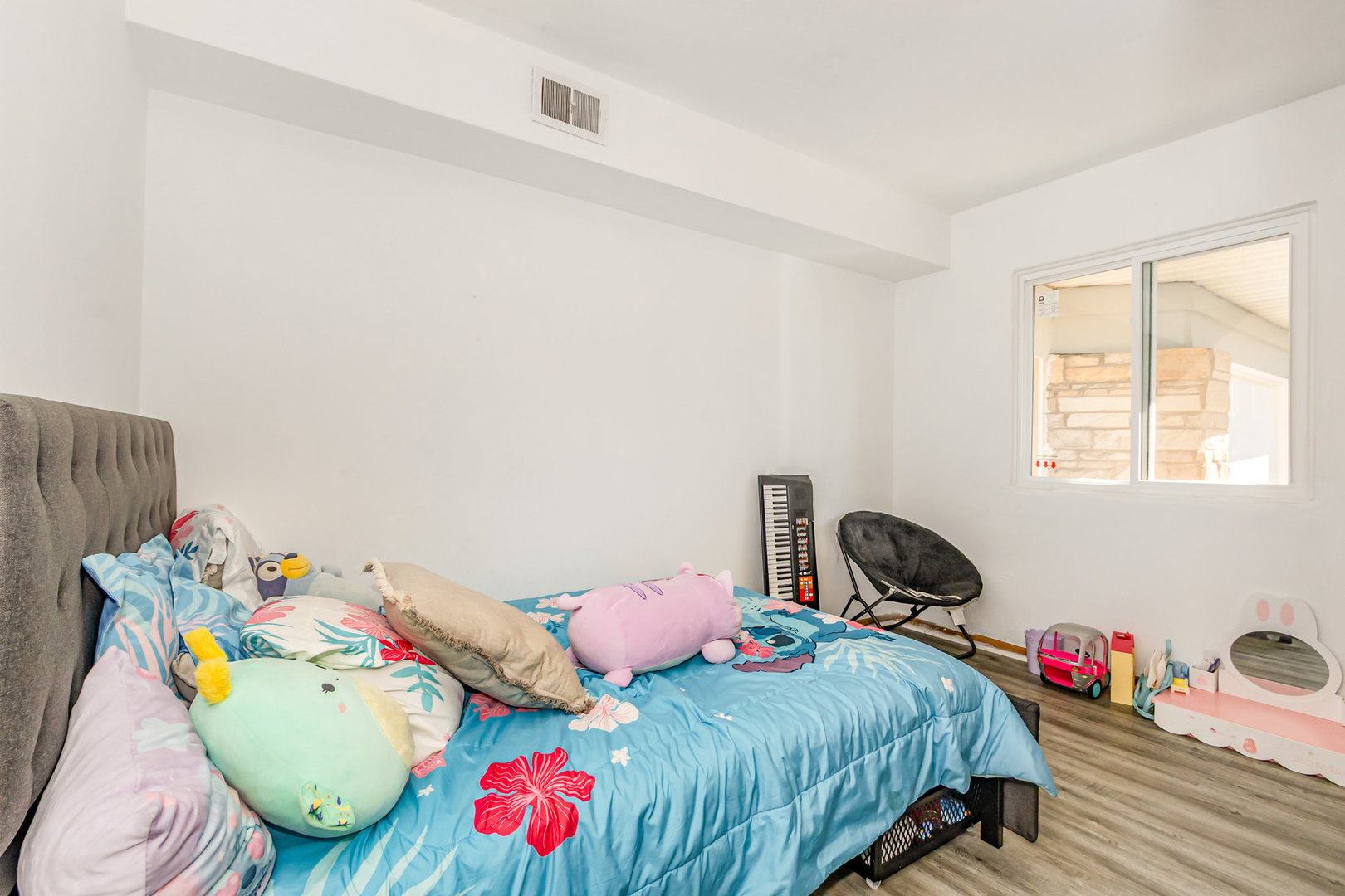 2535 Caton Farm Road Joliet, IL 60435 - Photo 19 of 25 a bedroom with a bed and a dresser