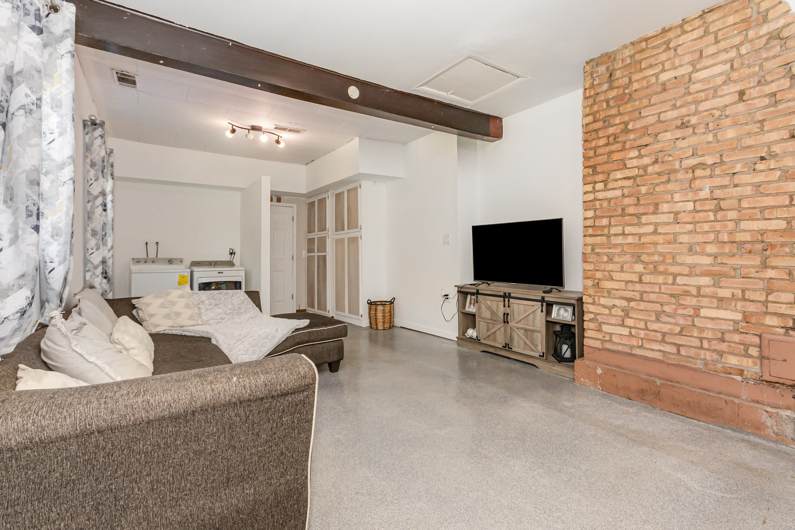 2535 Caton Farm Road Joliet, IL 60435 - Photo 9 of 25 a living room with furniture and a flat screen tv
