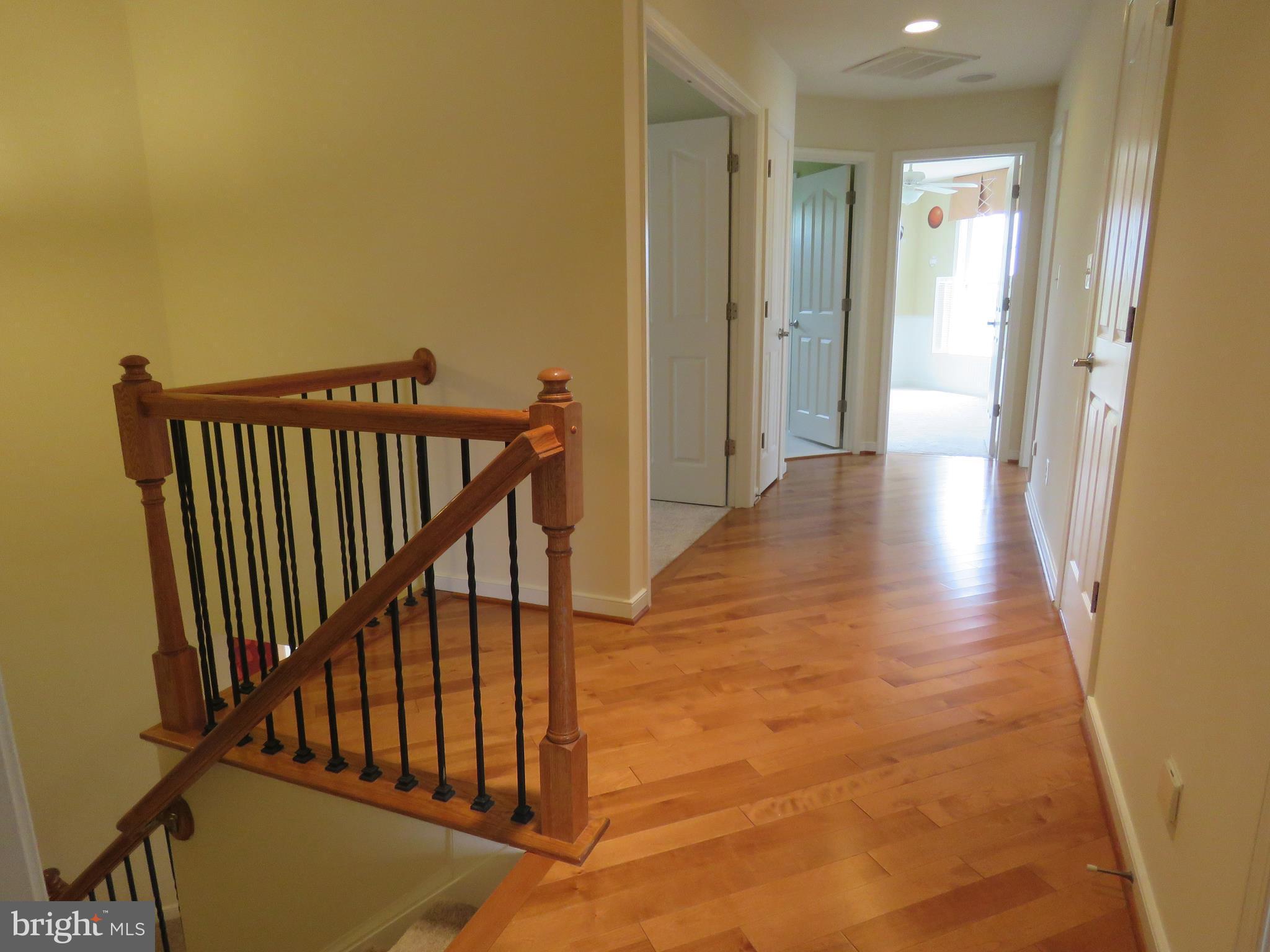 124 Standpipe Road Culpeper, VA 22701 - Photo 25 of 30 upper level hall with wood floors