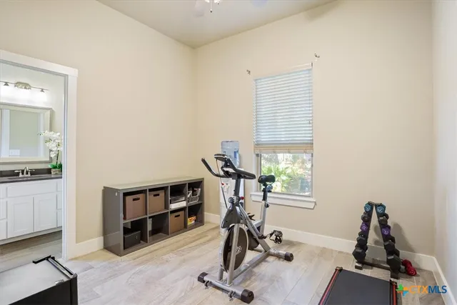 a view of a room with gym equipment