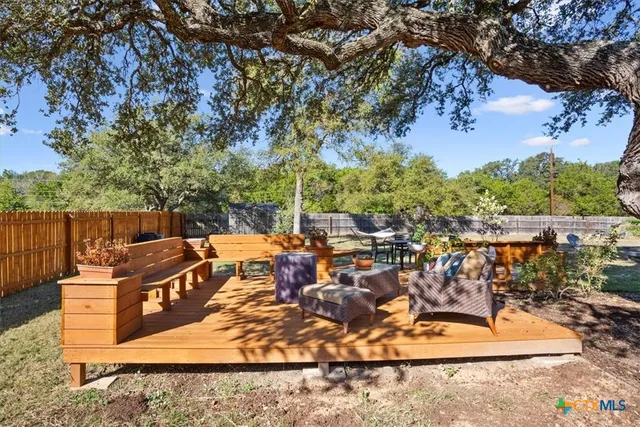 a view of a terrace with sitting area