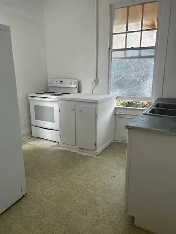 a utility room with washer and dryer