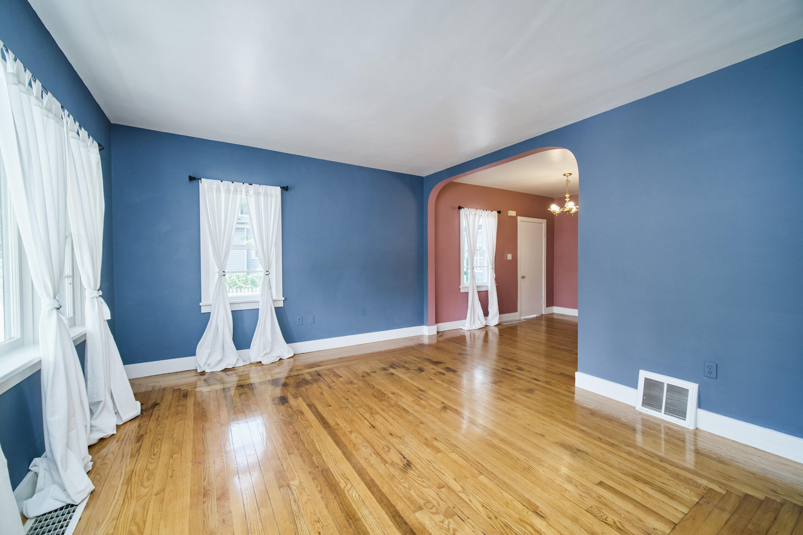 244 5th Street Manistee, MI 49660 - Photo 9 of 45 Arched opening between LR & DR