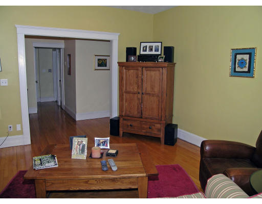 15 Claflin Road, Unit 1 Brookline, MA 02445 - Photo 3 of 13 a living room with furniture and a couch