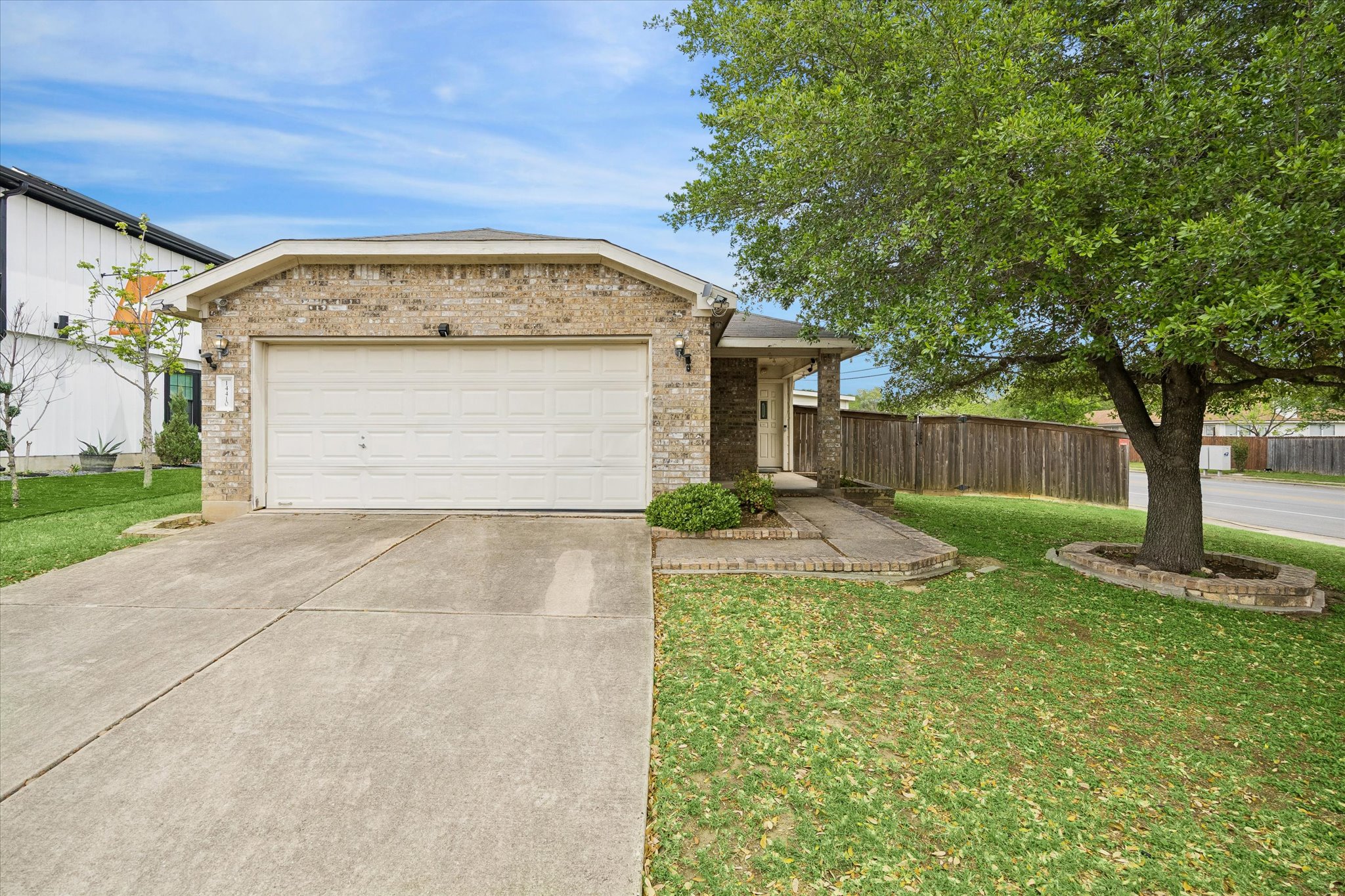 14410 Sandifer Street Austin, TX 78725 - Photo 1 of 10 a view of backyard of house
