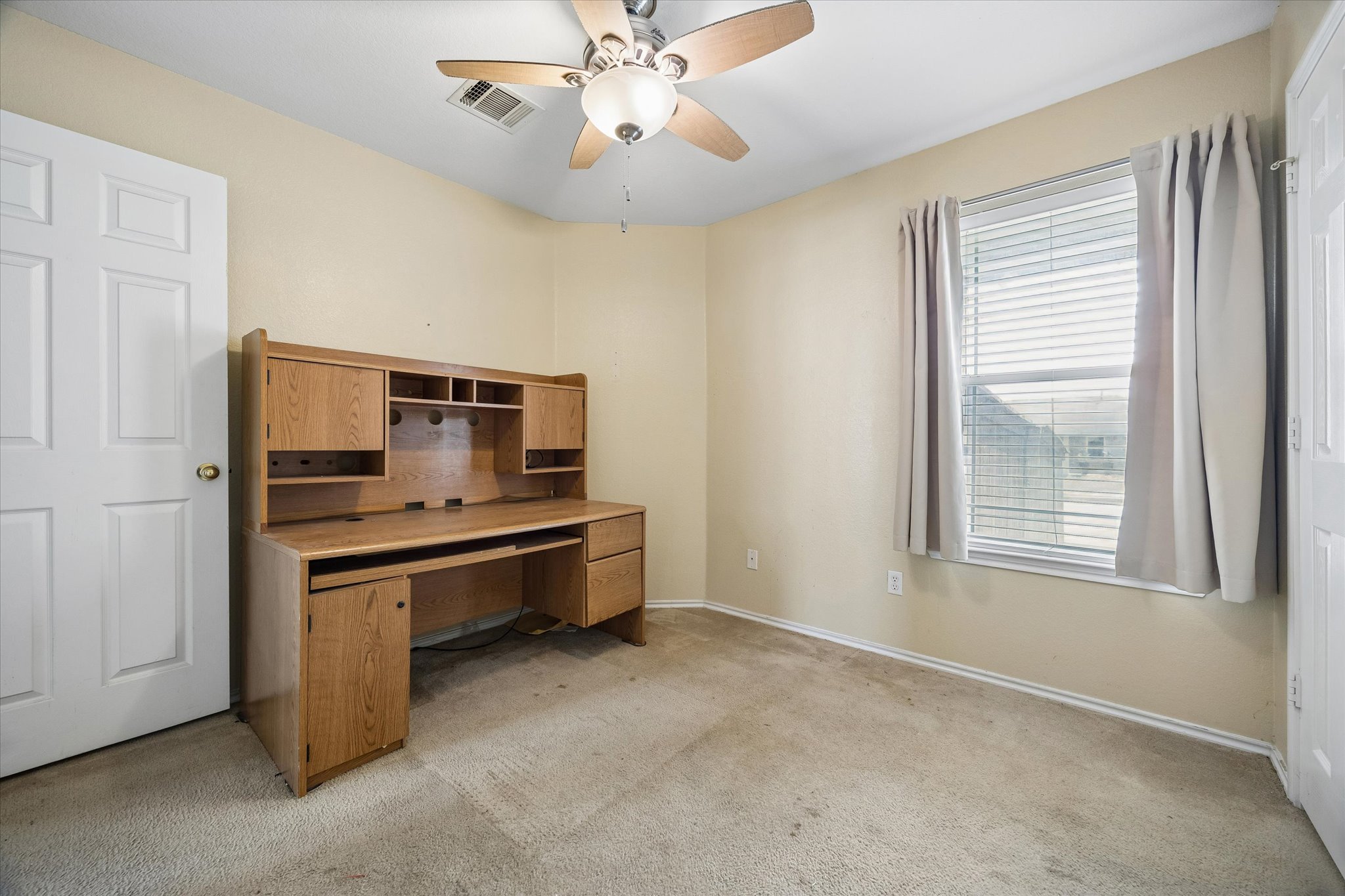 14410 Sandifer Street Austin, TX 78725 - Photo 7 of 10 a room with furniture and windows