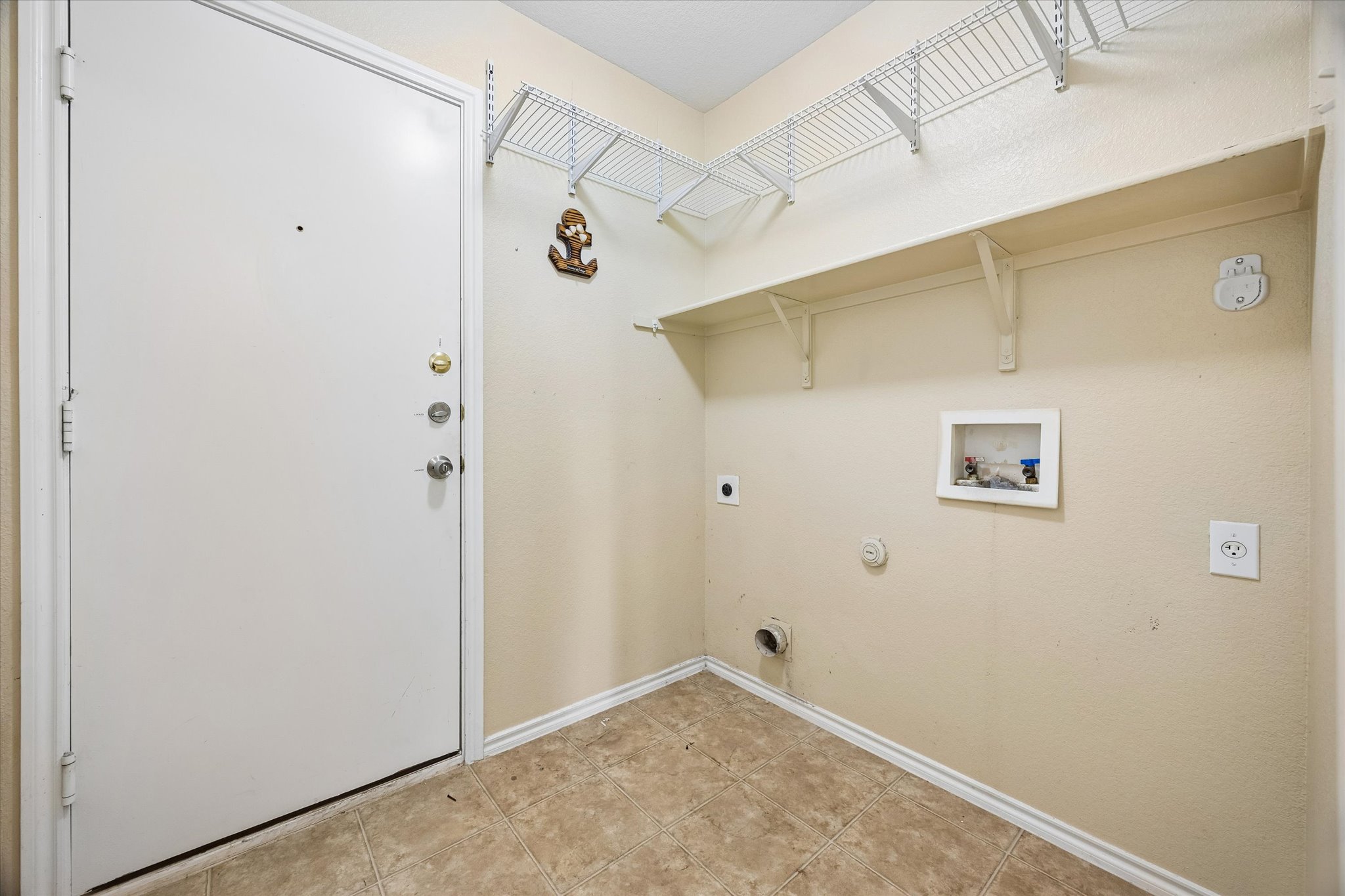 14410 Sandifer Street Austin, TX 78725 - Photo 9 of 10 a view of utility room