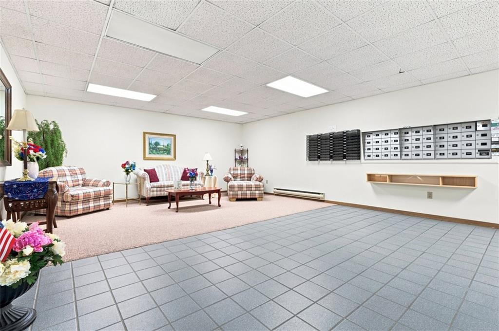 2850 Edgecliff Road, Unit 35 Lower Burrell, PA 15068 - Photo 22 of 28 Main level common sitting area.