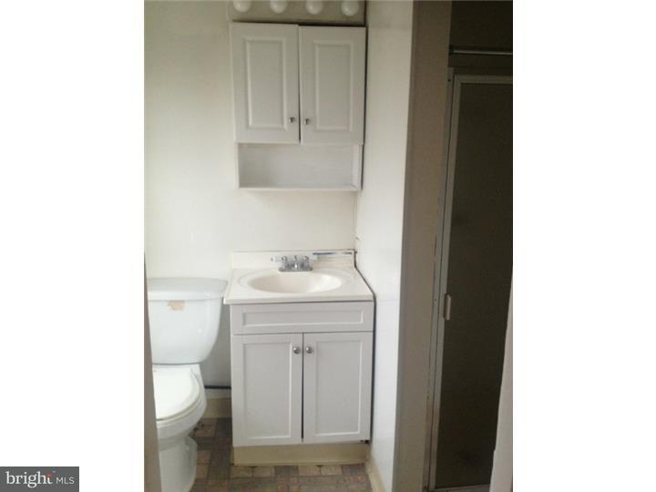 1 Breakneck Road, Unit 4 Medford, NJ 08055 - Photo 8 of 8 a bathroom with a sink toilet and vanity