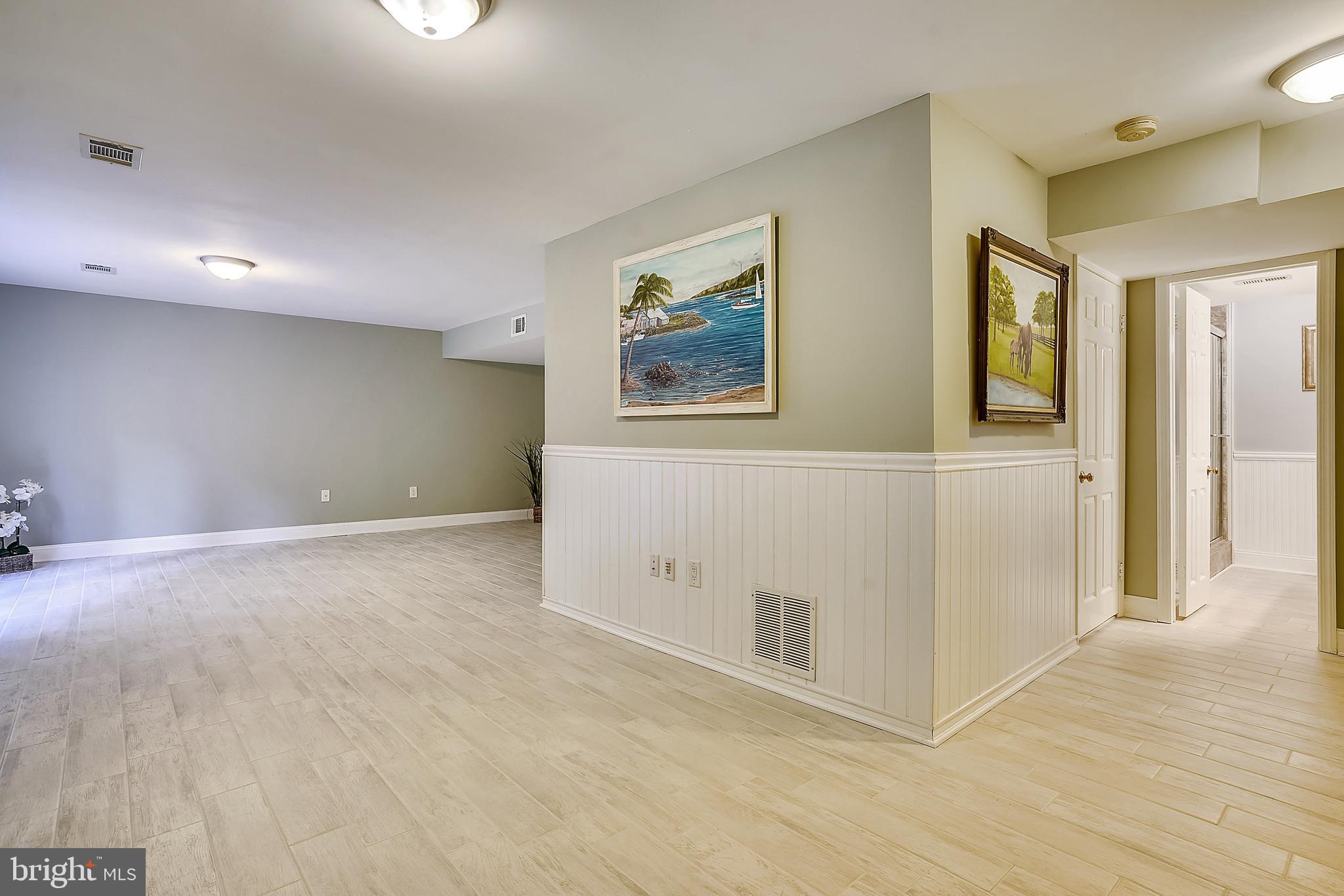 4522 Gilbertson Road Fairfax, VA 22032 - Photo 30 of 65 LL with new ceramic tile.