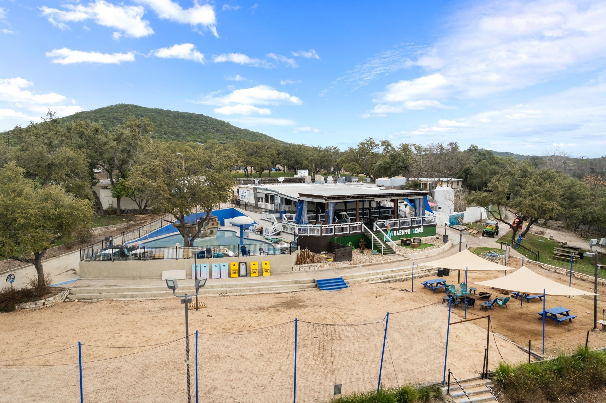 15902 Booth Circle Volente, TX 78641 - Photo 18 of 39 a view of a terrace with a garden and mountain view