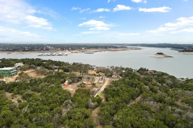 a view of a lake with a city