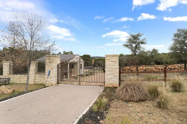 a view of a lake with a yard
